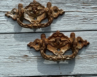 A pair of old French drawer/chest handles