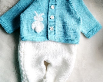 Knitted baby outfit soft. White pants and blue jacket. First baby newborn knitted clothes. Cute infant clothes. Take Home outfit for newborn