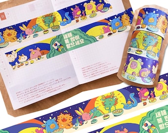 May include: Washi tape with a cartoon animal design and Korean text. The tape is displayed on an open notebook and a roll of tape. The tape features a variety of colorful animals.