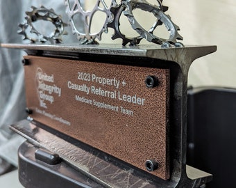 Trophy Award made from steel Ibeam with a lazer engraved aluminum name plate