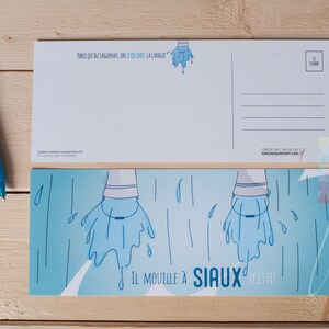 Carte Postale "Il mouille à siaux icitte!" | Saguenay | Carte | Impression | Souvenir du Saguenay | Papeterie | Postal card | Card | Print
