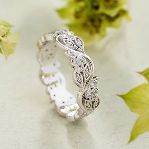 Unique wedding ring for woman with moissanites. Gold womens ring with flowers and milgrain details. Leaf and Vine gold ring.