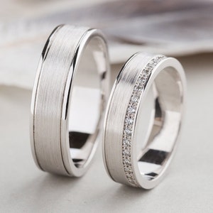 His and hers wedding bands made of 14k gold with diamonds. Matching wedding rings. Diamond solid gold bands. Matching wedding rings set