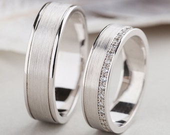 His and hers wedding bands made of 14k gold with diamonds. Matching wedding rings. Diamond solid gold bands. Matching wedding rings set