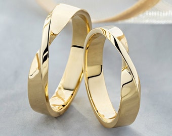 Mobius Wedding Bands His and Hers. Matching couple rings. Gold wedding band sets. 14k Gold Infinity Wedding Ring Set. Twisted Gold Bands