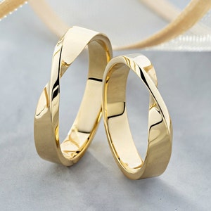 Matching Mobius Wedding Bands. His and Hers Mobius wedding rings set. Gold Mobius Rings. Matching couple rings. Gold wedding band sets.