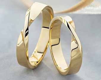 Matching Mobius Wedding Bands. His and Hers Mobius wedding rings set. Gold Mobius Rings