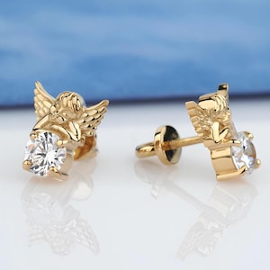 14k gold angel earrings. Gold stud earrings. Unique gold earrings. Angel jewelry. 14k gold stud earrings for women. Solid gold earrings.