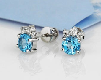 14K Solid Gold Blue Topaz and moissanite Stud Earrings: December Birthstone Jewelry. Gold earrings with topazes