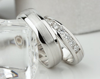Matching wedding bands set with diamonds. His and hers wedding rings. White gold wedding bands. Matching rings for couples.Wedding rings set