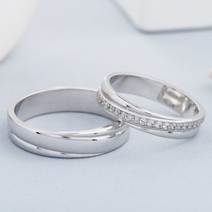 14k gold wedding bands with diamonds.Matching wedding bands. His and hers wedding rings. Gold wedding rings set with diamonds in female ring