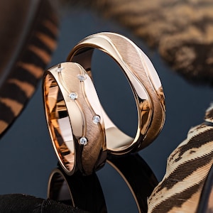 Rose gold matching wedding rings with diamonds. Unique wedding bands. His and hers wedding rings.Unique wedding rings set.His and hers bands