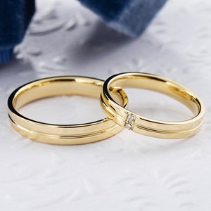 Simple gold wedding band set. His and hers wedding rings. Gold wedding rings. Thin wedding bands. Couple rings set. 14k gold bands.