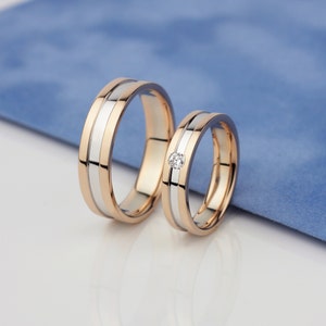 Two-tone gold wedding bands set.