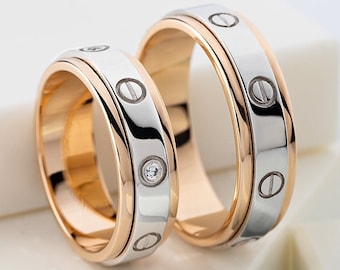 His and hers spinning rings made of solid gold. Unique wedding bands. Gold wedding rings set. Fidget Rings set. Matching wedding bands.