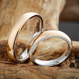 Classic wedding bands made of solid 14k gold. Gold wedding rings. Mixed metals wedding bands. Couples rings. Simple wedding bands.
