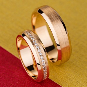 Rose gold wedding rings with diamonds. Matching wedding bands. His and hers wedding rings set. Gold wedding bands set with diamonds.