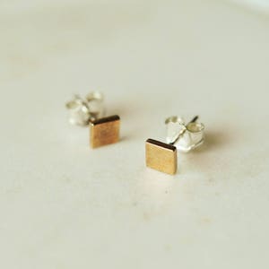 Tiny square studs Bronze