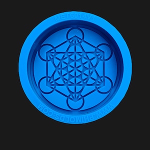 May include: Blue silicone mould with a raised geometric design of a flower of life pattern. The mould is circular and has the text "MET6014V1" and "WWW.PHIMOLD.COM" on the edge.