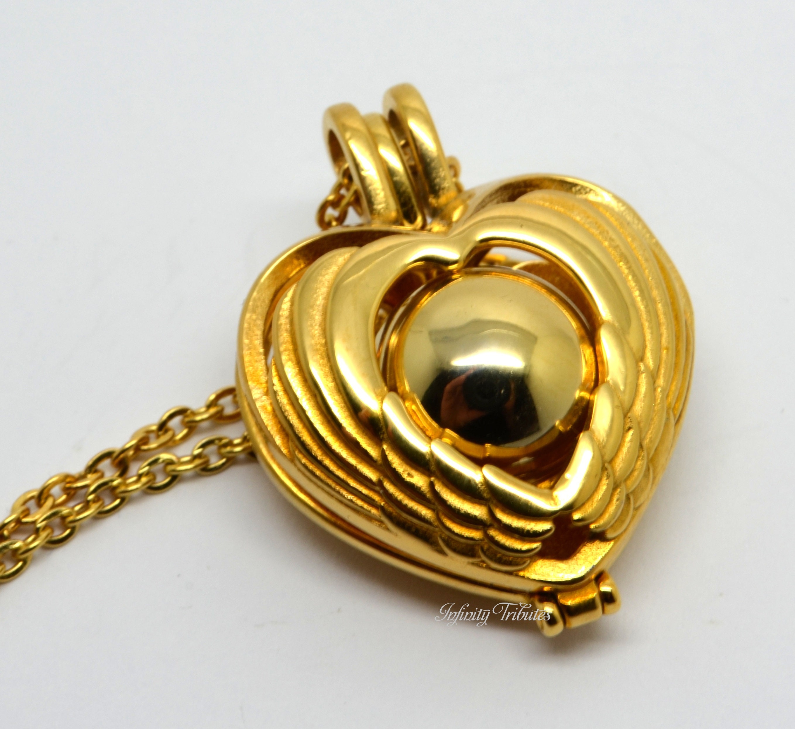 24 karat 2024 gold locket