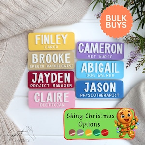 May include: A collection of seven rectangular name badges in yellow, tan, maroon, pink, purple, light blue, and dark blue. Each badge features white raised lettering displaying a name and a job title, including Finley, Brooke, Jayden, Claire, Cameron, Abigail, and Jason.