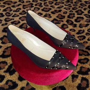 Louboutin store pearl shoes