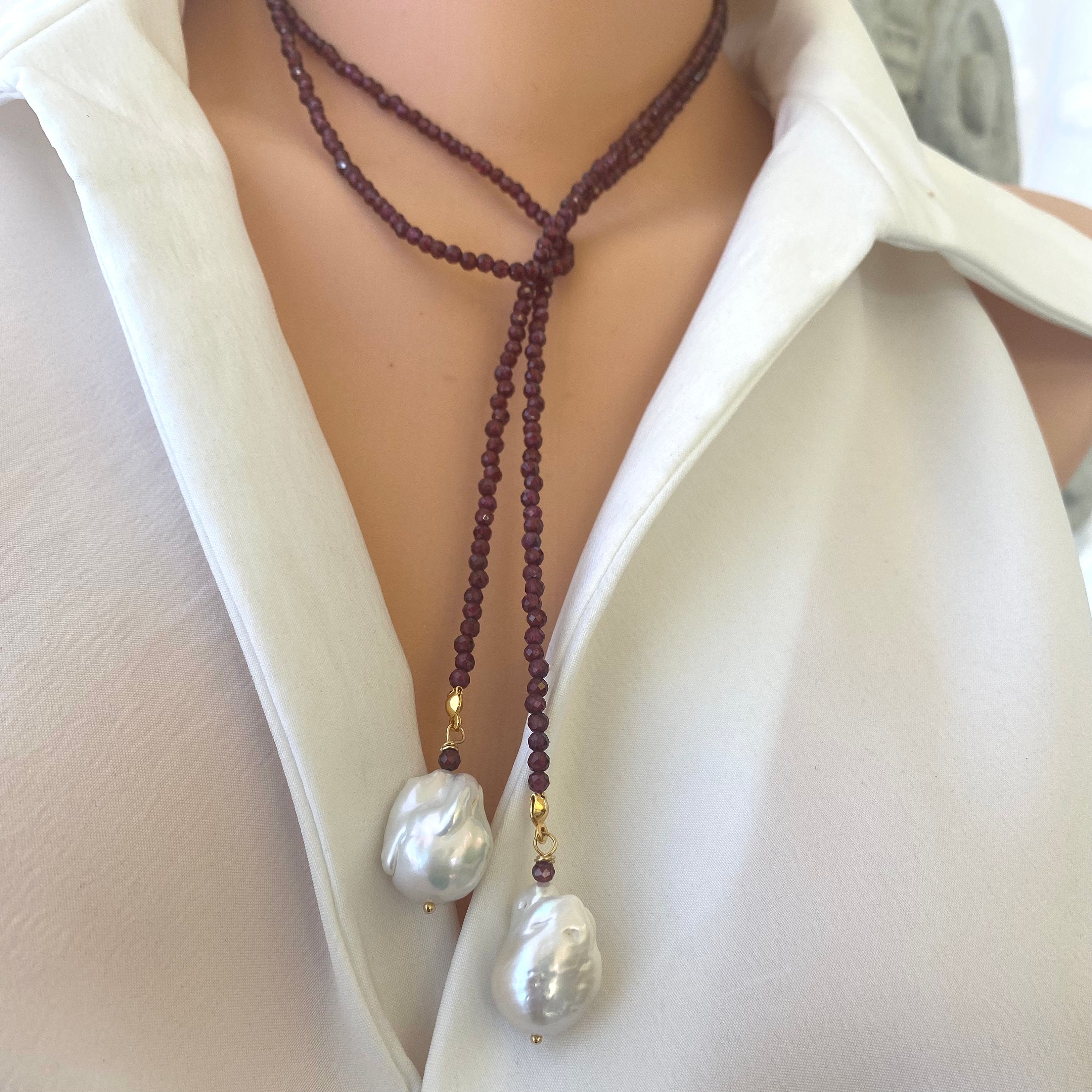 Single Strand of Red Garnet and Two Large Baroque Pearls