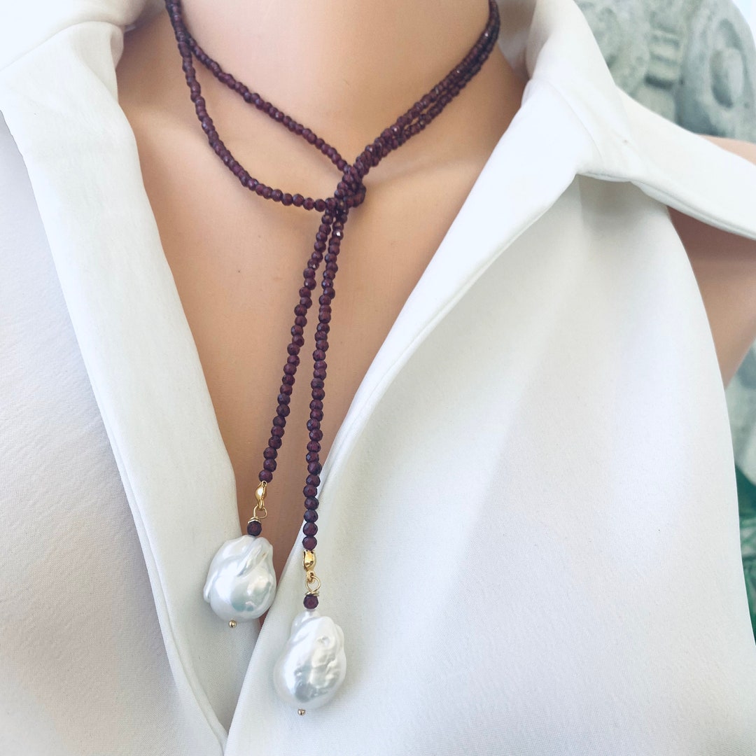 Single Strand of Red Garnet and Two Large Baroque Pearls