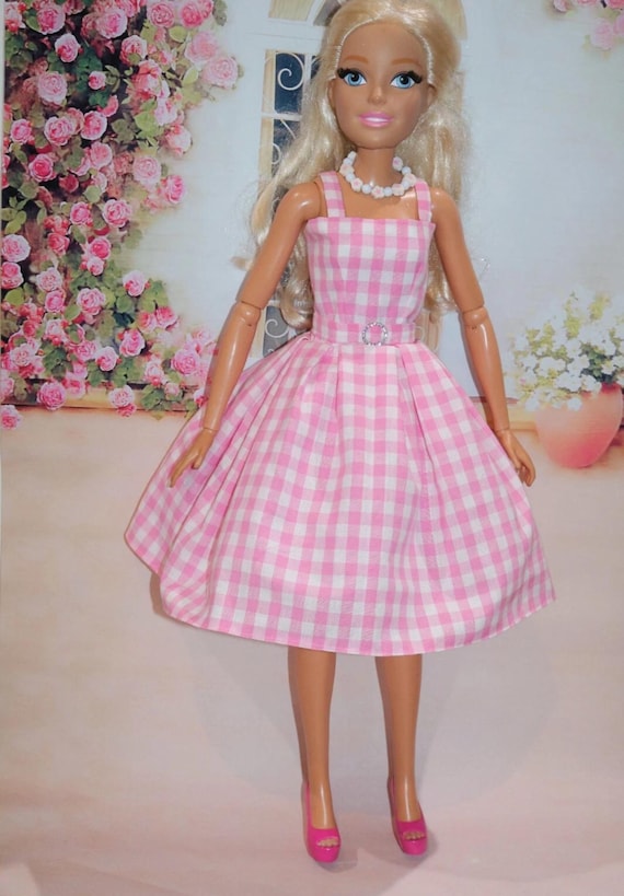 barbie dress toys Mattel Barbie Doll and Party Fashions Set, 1 ct inspired pink and white gingham dress with a matching belt and full Dress fits 28 inches Barbie