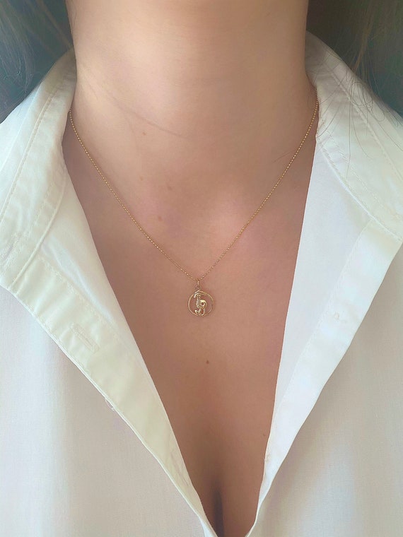 Gold capricorn store pendant necklace