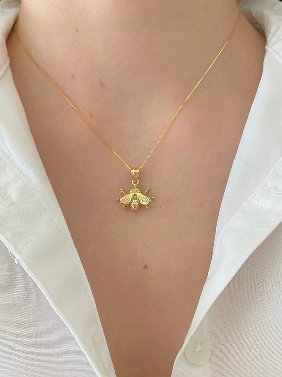 Gold bee charm necklace best sale