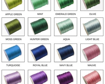 May include: A collection of 16 spools of waxed cotton cord in various colors, including apple green, mint, emerald green, olive, moss green, hunter green, aqua, light blue, turquoise, royal blue, navy blue, mauve, lavender, purple, plum, and pink.