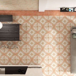 May include: Overhead view of a kitchen and living room area with patterned floor tiles in shades of beige, peach, and cream. The kitchen features dark wood tables, chairs, and a white countertop. A gray sofa with pillows is in the living room.