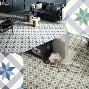 May include: A close-up of a patterned tile floor with a white background and blue and green star-shaped designs. The tile pattern is repeated throughout the image. The tiles are arranged in a grid pattern.
