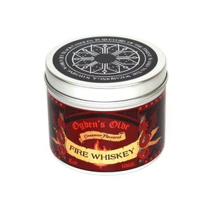 May include: A silver tin candle with a red label that says "Ogden's Olde Cinnamon Flavoured FIRE WHISKEY Est. 1862."