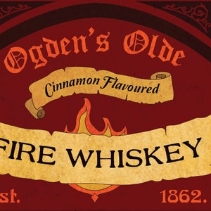May include: A red and gold label with a dragon design and the text "Ogden's Olde Cinnamon Flavored Fire Whiskey! Est. 1862."