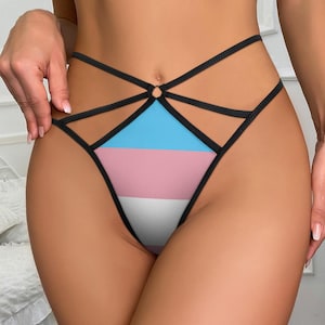 May include: Black lace underwear with a blue, pink, and white striped design.