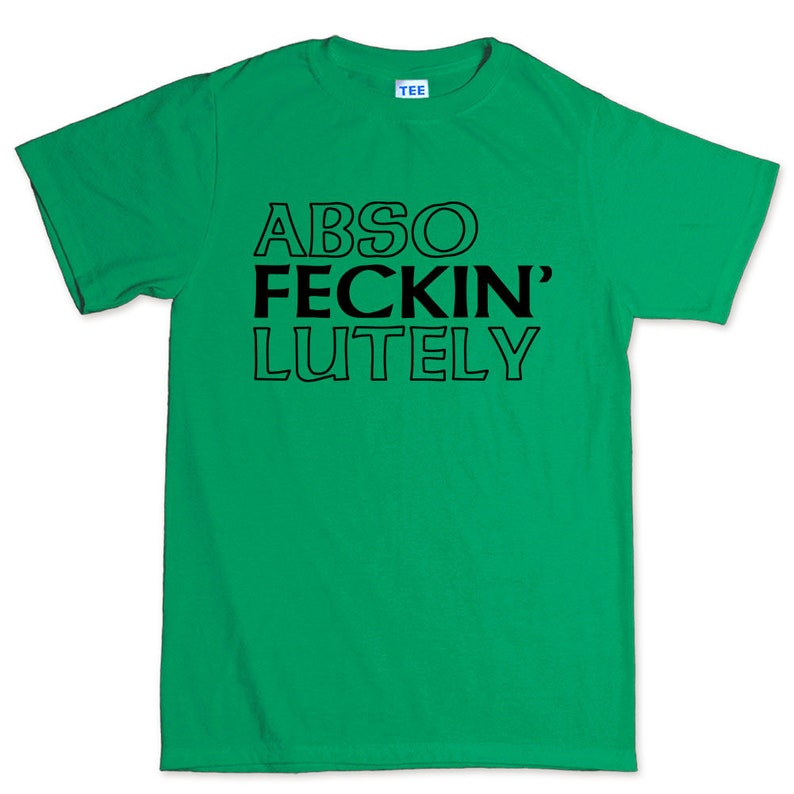 May include: A bright green t-shirt with the words "ABSO FECKIN' LUTELY" printed in bold black letters. The shirt has a crew neck and short sleeves. The word "TEE" is printed on the tag.