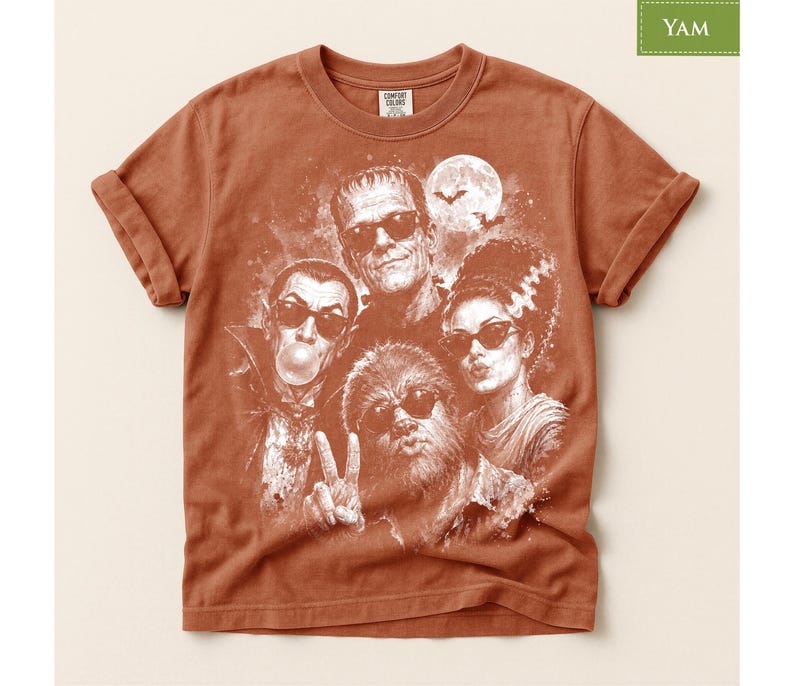 a t-shirt with a graphic design of a group of characters from the "Halloween" movie franchise, including Frankenstein's monster, Mary Shelley, and other iconic figures.