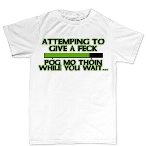 The image is a white t-shirt with a humorous text printed on it.