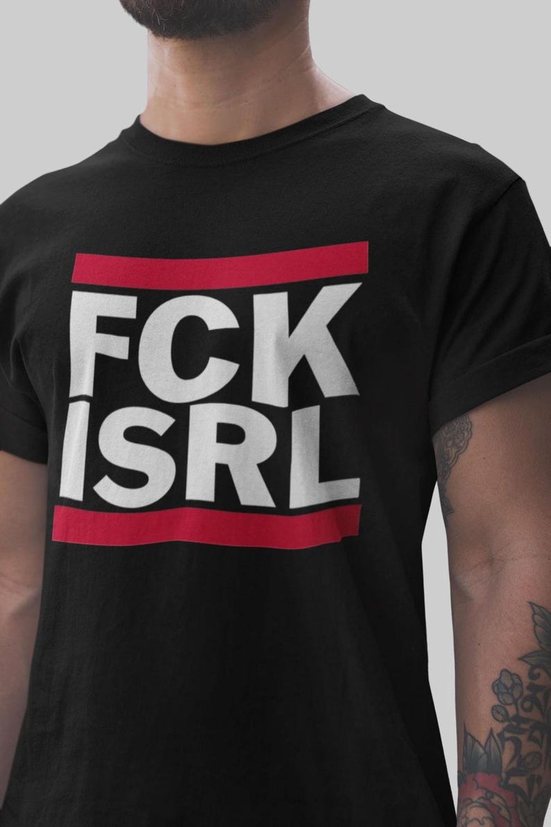 A person wearing a black t-shirt with the text "Fck IsRL" printed on it.