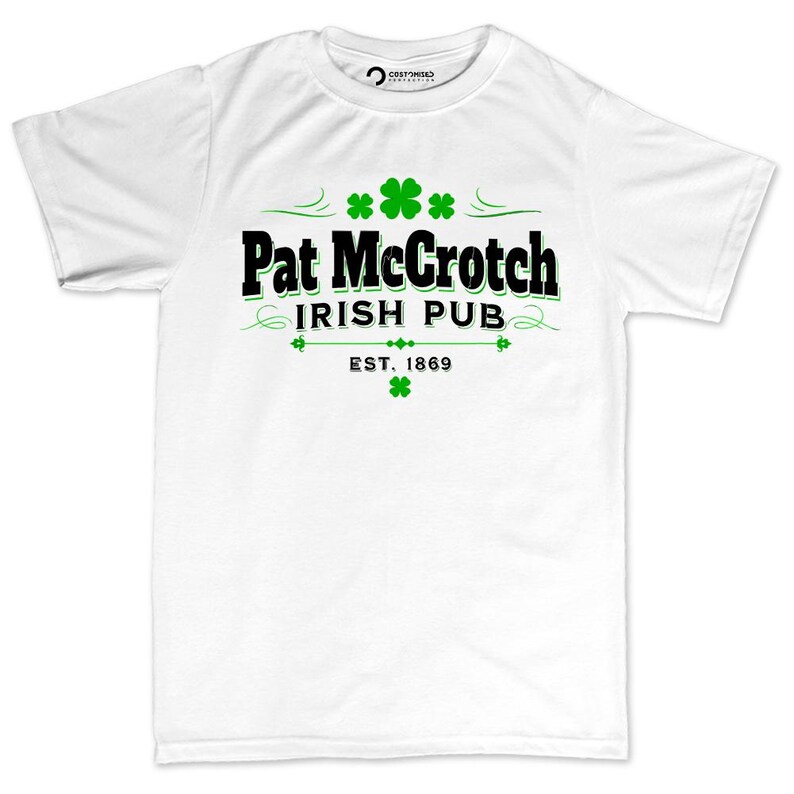 A white t-shirt with the text "Pat McCroch Irish Pub EST. 1869" printed on it, along with four shamrocks.