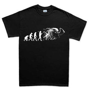 May include: Black t-shirt with a white graphic of the evolution of man ending with a Cthulhu monster.