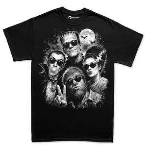A black and white t-shirt with a graphic design featuring the characters from the horror film "The Haunting of Hill House" in a group portrait.