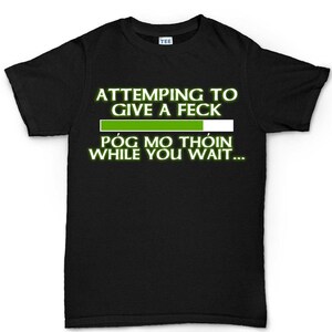 The image is a black t-shirt with white text and a green bar graphic.