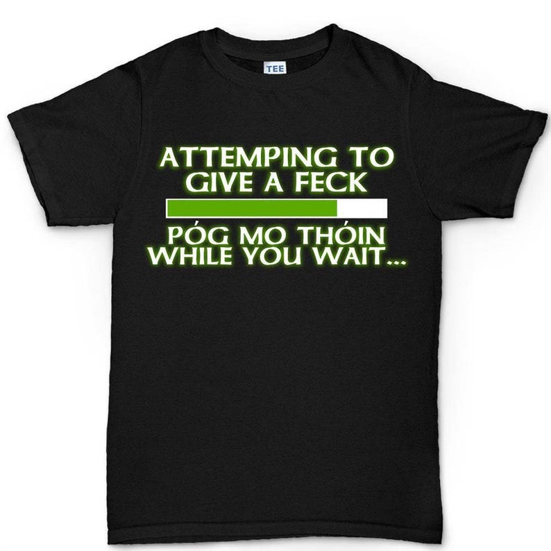 The image is a black t-shirt with white text and a green bar graphic.