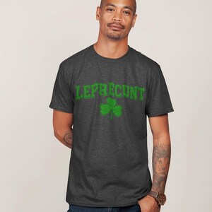 A man wearing a grey t-shirt with the text "LEP SCOUT" printed on it, standing against a plain background.