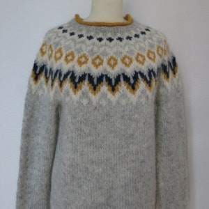 Handmade Icelandic wool sweater or „Lopapeysa“ as we call it, knitted in Iceland.