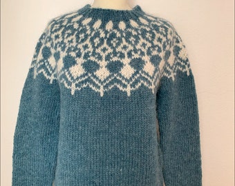 Handmade Icelandic wool sweater or „Lopapeysa“ as we call it, knitted in Iceland.