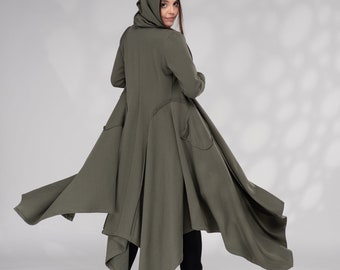 May include: A long, flowing, green hooded jacket with a draped, asymmetrical hemline. The jacket has a relaxed fit and is made of a soft, comfortable fabric.